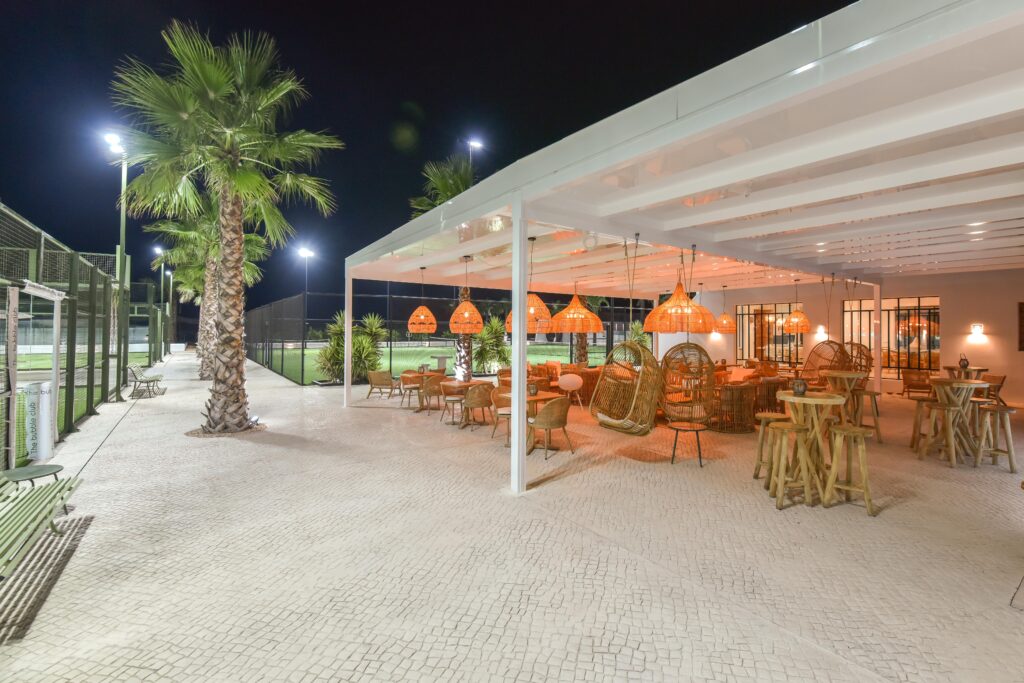 Ibiza tennis club bar lit up at night